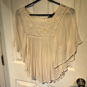 Cream blouse & winged arms